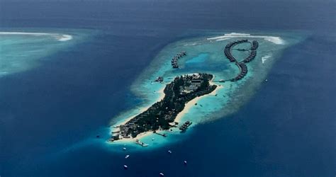 Maldives Atolls - 26 Atolls, coral reef supporting numerous islands