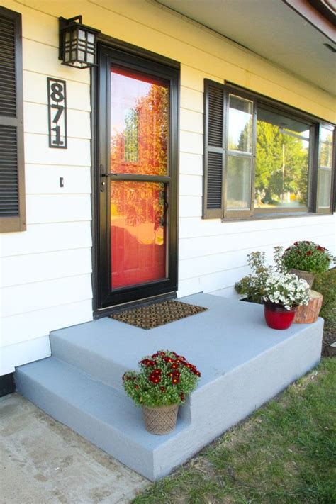 An Affordable Porch Makeover - Bright Green Door | Porch makeover, Painted front porches ...