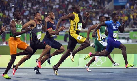 Bolt sprints into history with third gold in 100 | The Japan Times