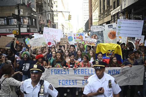 Thousands of kids storm Manhattan for climate change rally