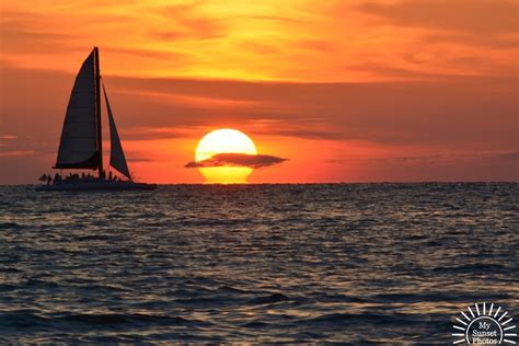 Clearwater Beach Sunset with Sailing Boat and Sun - My Sunset Photos