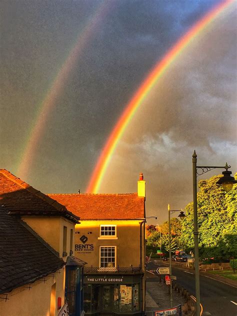 Downpours and double rainbows seen as thunderstorms hit the region ...