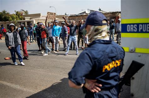 Protests rock South African suburb after police shot disabled teen | Daily Sabah