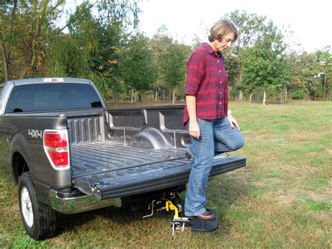 Step extends out beyond truck tailgate. Easy up and down access to truck bed.