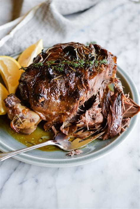 This leg of lamb is slow roasted with classic Greek flavors of oregano, rosemary, lemon juice ...