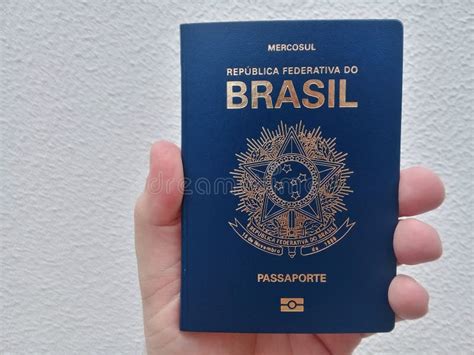 Brazilian Passport, Banknotes And Credit Card On A Square Plate With The Flag Of Brazil In The ...