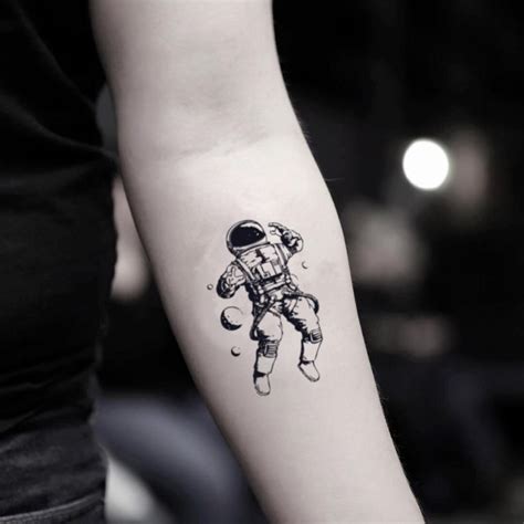 Small nasa astronaut major tom man on the moon illustrative tattoo design. Safe and non-toxic ...