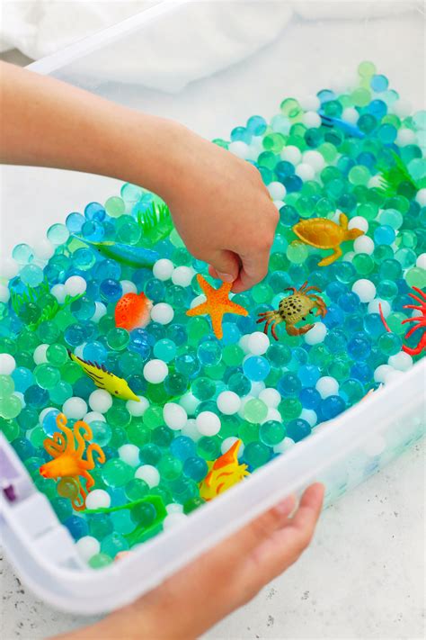 How to Make an Ocean Sensory Bin with Water Beads • One Lovely Life