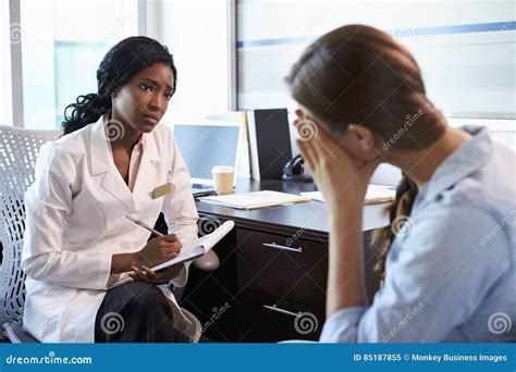 Doctor in Consultation with Depressed Female Patient Stock Image - Image of caring, health: 85187855