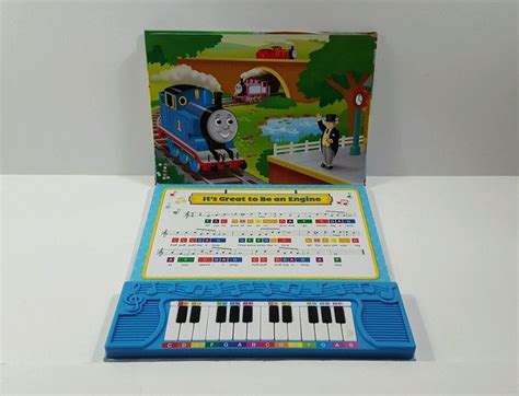 Thomas & Friends Play and Learn Piano Songs, Editors of Publications Internation | Piano songs ...