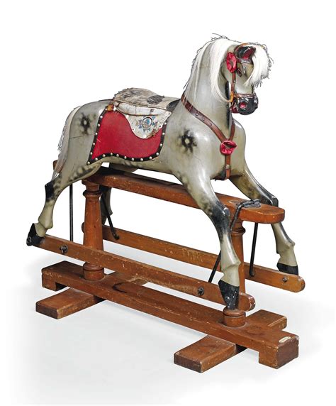 A POLYCHROME PAINTED ROCKING HORSE , BY PHINS LTD., MURRAYGATE, DUNDEE ...