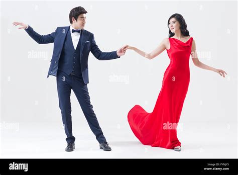 Elegant young couple dancing Stock Photo - Alamy