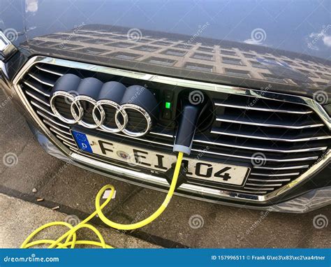 An Audi A3 E-tron Plug-in Hybrid Car Charging in the Streets of Leipzig ...