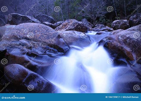 Slow Shutter Speed Water Photography of a River Waterfall in the Mountains. Stock Image - Image ...