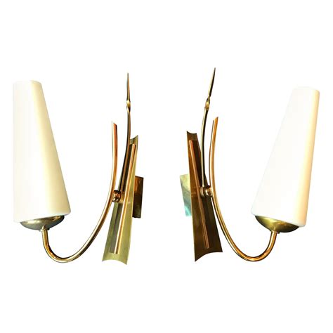 A Pair of Mid Century Articulated Modern Sconces at 1stDibs