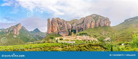 Panoramic View at the Aguero Village with Mallos De Aguero Rock Formations in Spain Stock Image ...