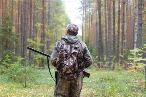 hunter walking in the forest | Sports & Recreation Stock Photos ...