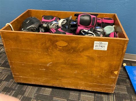 Wheeled Wood Storage Box w/Assorted Rollerblades & Safety Gear - Gavel Roads Online Auctions