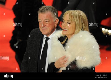 Robert Pattinson's parents, Claire and Richard Pattinson, arrive for the premiere of the movie ...