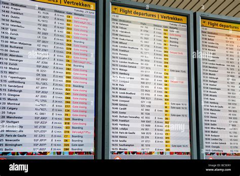 Departure board at Schiphol Airport Stock Photo - Alamy