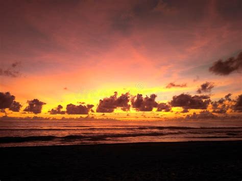 Sawarna beach sunset stock photo. Image of reflection - 222069350