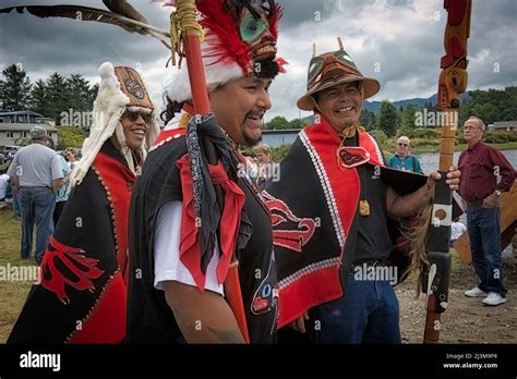 Dressed in colorful traditional clothing, Tlingit tribe leaders celebrate after a ceremony ...