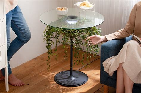 The Oasis planter is actually a side table with lamp - Yanko Design