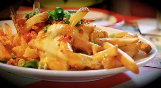 Cheese, bits of bacon and fries | A combination that is boun… | Flickr