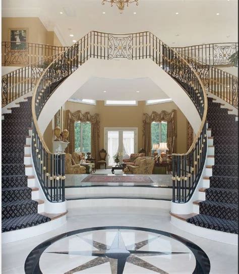 The inlaid marble invites you into a magnificent entrance which ...