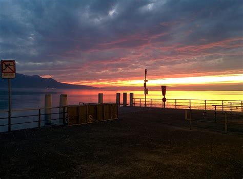 View from shore to lake at sunset, switzerland free image download