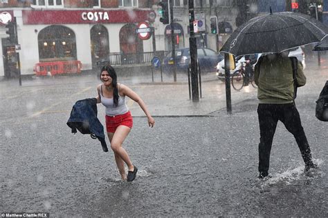 Flash floods hit large parts of London with cars abandoned in 2ft-deep torrents | Daily Mail Online