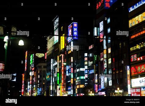 Neon signs in the streets of Shinjuku at night, Tokyo, Japan Stock ...