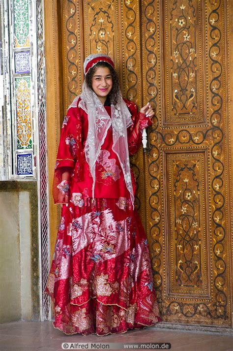 Iranian girl in traditional Shirazi dress photo. Narenjestan museum ...