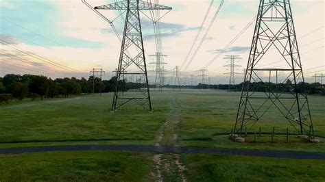 Aerial Push In To High Tension Power Lines Stock Footage SBV-327004768 ...