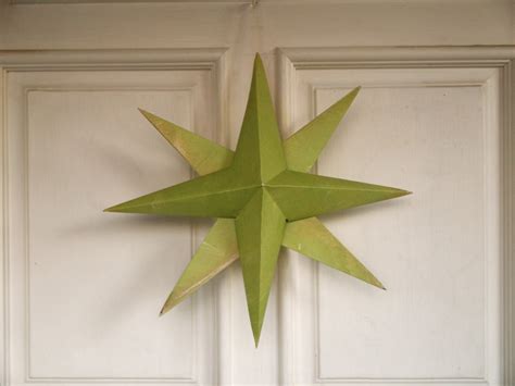 Folded Paper Christmas Origami Stars - The Magic Onions