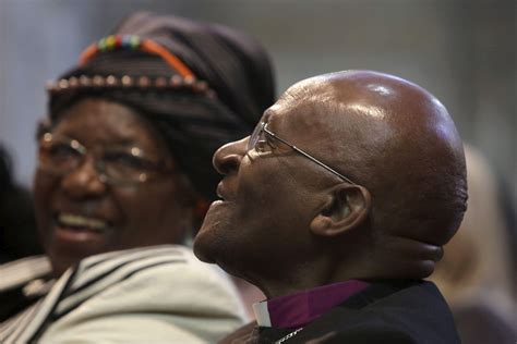 Archbishop Desmond Tutu and his wife Leah share a moment shortly before renewing their vows as ...