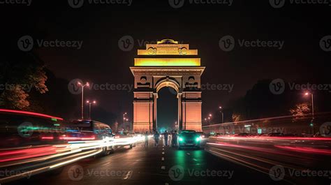 India gate at night with multicolored lights. This landmark is one of ...