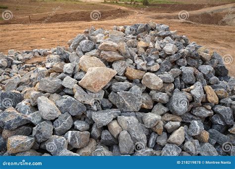 Piles of Gravel Limestone Rocks on Construction Site. Break Stones. Stock Photo - Image of ...