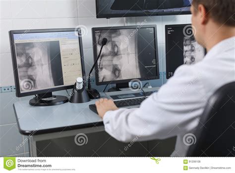 Doctor Looking at the Computer Monitor Stock Photo - Image of looking, hospital: 91206108