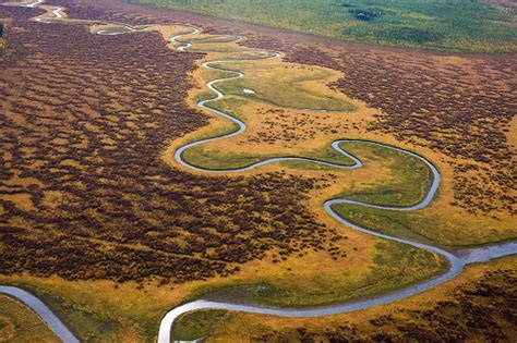 Aerial View Of Meandering River And Landscape Stock Photo - Download Image Now - iStock