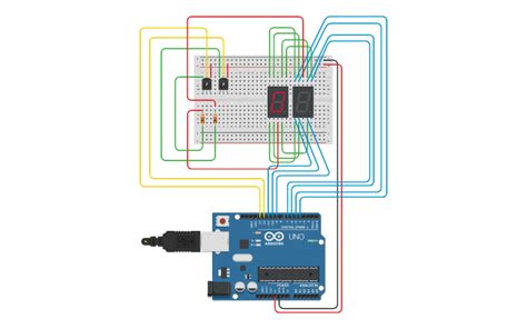 Circuit design 0 - 99 Counter With Two 7 Segment Display - Tinkercad