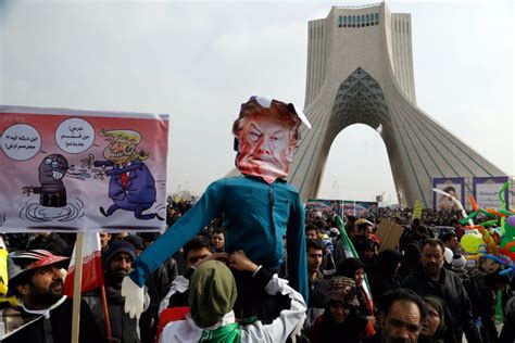 Thousands celebrate Iranian Revolution, trampling U.S. flag and ...