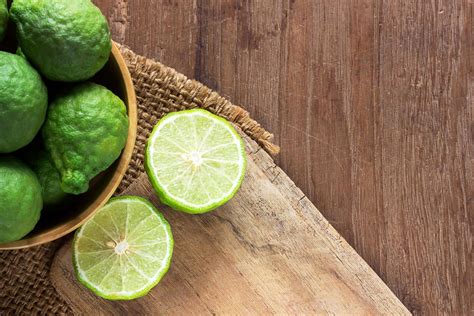 fresh bergamot and bergamot slice in wooden bowl 5345795 Stock Photo at ...