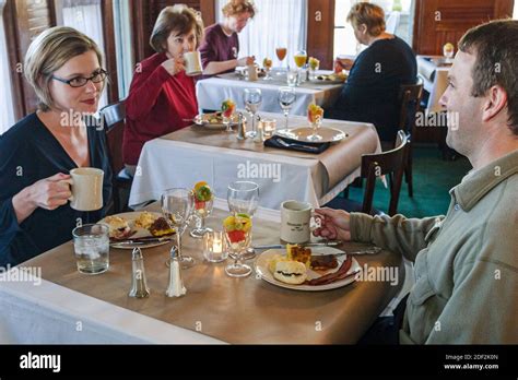 Alabama Mentone Mentone Inn Bed & Breakfast B&B,guests couple eating inside interior Stock Photo ...