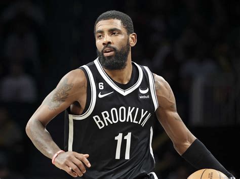 Kyrie Irving rejoins the Nets after suspension and apologizes : NPR