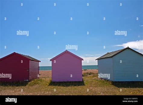 Colourful beach huts on beach at Hayling Island Stock Photo - Alamy