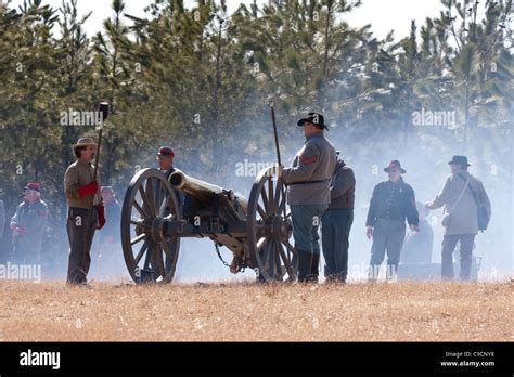 Soldiers firing cannon at the civil war reenactment Stock Photo - Alamy