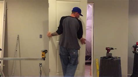 Learn How to install a Prehung door in less than 12 minutes - YouTube