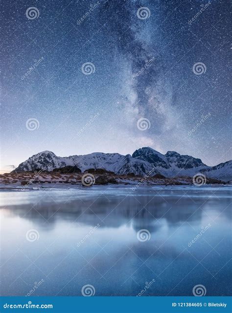 Night Sky and Reflection on the Frozen Lake. Stock Image - Image of ...