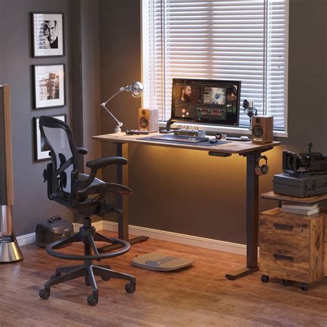 The Rise of Ergonomics: Benefits of Electric Standing Desks – Praise The Sun